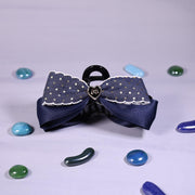 Denim Bow Clutcher