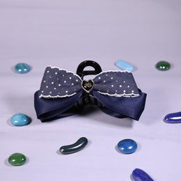 Denim Bow Clutcher