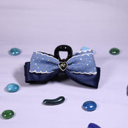 Denim Bow Clutcher